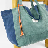 <tc>Pack</tc> Grüne Leinen-Shopper-Tasche und <tc>Kulturtasche</tc>