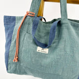 <tc>Pack</tc> Grüne Leinen-Shopper-Tasche und <tc>Kulturtasche</tc>